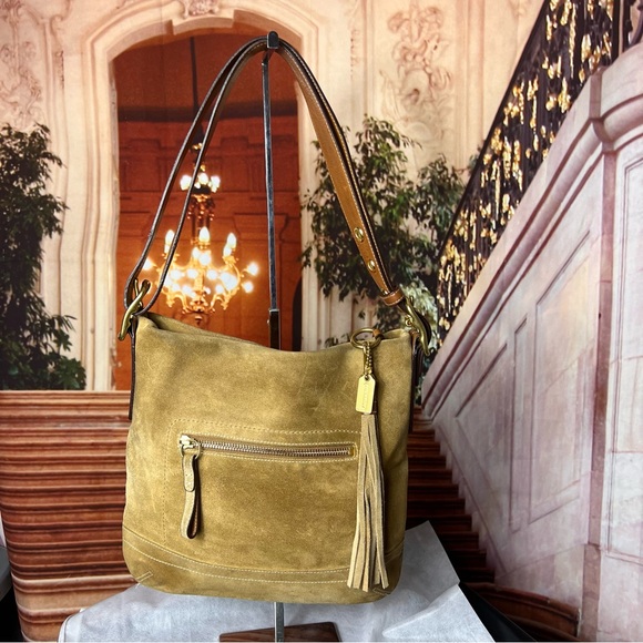 Coach Handbags - Coach Vintage Suede Tan Shoulder Bag, adjustable strap, tassel metal logo charm